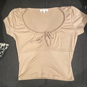 Tan color shirt, size small,